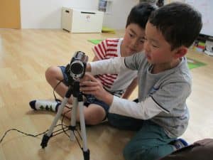 Students learn how to operate a video camera
