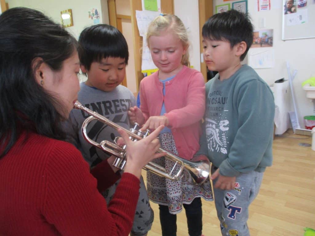 IMG_4861 A teacher invites children to explore musical instruments