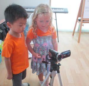Students learn how to use a video camera